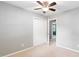 Bedroom features neutral walls, carpet, and a closet for convenient storage at 509 E Millbrook Rd, Raleigh, NC 27609