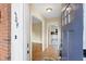 Inviting entryway features hardwood floors and views into the living area and kitchen at 509 E Millbrook Rd, Raleigh, NC 27609