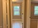Hallway featuring access to bedrooms at 509 E Millbrook Rd, Raleigh, NC 27609