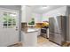Modern kitchen with stainless steel appliances and granite countertops at 509 E Millbrook Rd, Raleigh, NC 27609