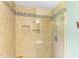 Shower features stylish tile work and built in niches, making it a luxurious and functional space at 509 E Millbrook Rd, Raleigh, NC 27609