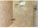 Luxurious shower with pebble floor, integrated bench and large niches at 509 E Millbrook Rd, Raleigh, NC 27609