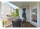 Cozy patio area with metal table and chairs, perfect for outdoor relaxation at 5416 Whisperwood Dr, Durham, NC 27713