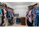 Large walk-in closet with ample storage space, perfect for organizing your wardrobe and accessories at 5416 Whisperwood Dr, Durham, NC 27713
