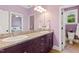Bathroom featuring a granite countertop and an open doorway leading into a bedroom at 639 Cedar Grove Rd, Pittsboro, NC 27312