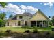 Expansive home featuring a screened porch, patio, and a large backyard for outdoor enjoyment at 639 Cedar Grove Rd, Pittsboro, NC 27312