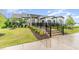 Exterior view of the clubhouse, set amid well-maintained landscaping at 646 Shelford Trl, Zebulon, NC 27597