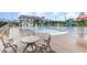 Enjoy a large community pool featuring a slide, seating, and a well-maintained building on a sunny day at 646 Shelford Trl, Zebulon, NC 27597