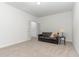 Living room features a sofa, side table, and double doors at 646 Shelford Trl, Zebulon, NC 27597