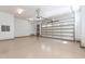 Spacious garage with epoxy flooring, ample storage, and automatic doors for easy vehicle access at 7116 Dumfries Ln, Chapel Hill, NC 27514