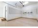 Tidy garage featuring a pegboard for tool storage and shelves for organized utility supplies at 7116 Dumfries Ln, Chapel Hill, NC 27514