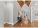 Hallway with wood floors and a view of the staircase at 7116 Dumfries Ln, Chapel Hill, NC 27514