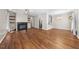 Spacious living room with hardwood floors, a fireplace, and an open layout, with plenty of space for entertaining guests at 75 Stone Hill Ct, Durham, NC 27704