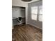 Home office space featuring a built-in desk, a comfortable chair, and natural light from nearby windows at 7824 Hemlock Ct, Raleigh, NC 27615