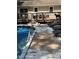 Spacious wooden deck with inground pool, perfect for entertaining and enjoying summer days at 7824 Hemlock Ct, Raleigh, NC 27615