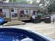 Relaxing pool deck with a wooden deck and comfortable seating, perfect for enjoying summer days at 7824 Hemlock Ct, Raleigh, NC 27615