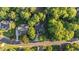 Overhead angle displays the home with well-maintained landscaping on a corner lot in a mature neighborhood at 905 Neuse Ridge Dr, Clayton, NC 27527