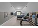 Large bedroom with carpet, fitness equipment, TV, and decor for a personalized space at 905 Neuse Ridge Dr, Clayton, NC 27527