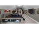 Large bedroom with carpet, fitness equipment, TV, and decor for a personalized space at 905 Neuse Ridge Dr, Clayton, NC 27527
