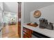 Coffee bar near the kitchen with coffee maker, beverage fridge, and access to dining area at 905 Neuse Ridge Dr, Clayton, NC 27527