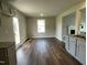 Inviting dining space with hardwood floors, connecting the kitchen to other living areas at 94 Starry Sky Dr, Benson, NC 27504