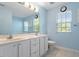 Bathroom features a double vanity, ample storage, updated fixtures, and clean finishes at 1 Edgebrook Cir, Durham, NC 27703