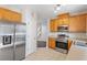 Modern kitchen with stainless steel appliances, ample cabinetry, and a functional layout for cooking at 1 Edgebrook Cir, Durham, NC 27703