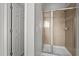 Modern bathroom with a glass-enclosed shower featuring neutral tile and a sleek design at 1028 Bellenden Dr, Durham, NC 27713