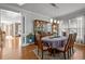 Bright dining room with wood floors, cabinetry, and seamless flow to other living spaces at 1028 Bellenden Dr, Durham, NC 27713
