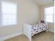 Bedroom filled with natural light and featuring neutral decor at 10529 Sablewood Dr # 116, Raleigh, NC 27617