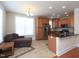 Well-designed kitchen with stainless steel appliances, granite countertops, and a cozy seating area at 10529 Sablewood Dr # 116, Raleigh, NC 27617
