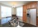Charming kitchen featuring stainless steel appliances, lots of storage, and a cozy breakfast nook at 10529 Sablewood Dr # 116, Raleigh, NC 27617