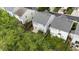 Overhead view of backyard and surrounding houses in the neighborhood at 107 Caraleigh Ct, Morrisville, NC 27560