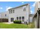Two-story home featuring well-kept lawn, patio and a white door at 107 Caraleigh Ct, Morrisville, NC 27560