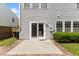 Back of home with patio and fence at 107 Caraleigh Ct, Morrisville, NC 27560
