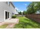 Backyard with patio and fenced yard at 107 Caraleigh Ct, Morrisville, NC 27560