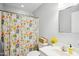 Bright bathroom featuring a shower, a sink and colorful accessories at 1102 Whiston Dr, Apex, NC 27502