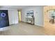 Sunlit living room showcasing modern floors, a decorative table with art, and a welcoming atmosphere at 116 Lumpkin St, Raleigh, NC 27610