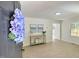 Bright living room with wood floors, neutral walls, stylish decor, and abundant natural light at 116 Lumpkin St, Raleigh, NC 27610