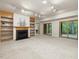 Finished basement with fireplace and natural light from sliding glass doors at 120 Spring Hollow Ln, Cary, NC 27518