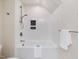 Clean white bathroom with a soaking tub and shower combination at 120 Spring Hollow Ln, Cary, NC 27518