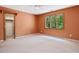 Comfortable bedroom with a large window and neutral carpeting at 120 Spring Hollow Ln, Cary, NC 27518