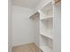 Walk-in closet with built-in shelving for optimal organization and storage space at 120 Spring Hollow Ln, Cary, NC 27518