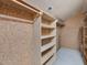 Spacious walk-in closet with custom shelving for organization at 120 Spring Hollow Ln, Cary, NC 27518