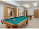 Finished basement game room with pool table and foosball table at 120 Spring Hollow Ln, Cary, NC 27518