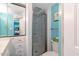 Stylish bathroom featuring a shower, toilet, and ample storage space in neutral tones at 135 Sagamore Dr, Louisburg, NC 27549