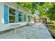 Charming home exterior with blue shutters, large deck, and screened-in porch at 135 Sagamore Dr, Louisburg, NC 27549