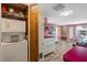 Eat-in kitchen with laundry nook, neutral walls, and white cabinets at 135 Sagamore Dr, Louisburg, NC 27549