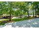 Breathtaking waterfront view with boat dock and ample space for outdoor enjoyment at 135 Sagamore Dr, Louisburg, NC 27549