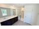 Elegant bathroom with double vanity and tiled shower, offering a luxurious and functional space at 147 Gobbler Dr, Smithfield, NC 27577